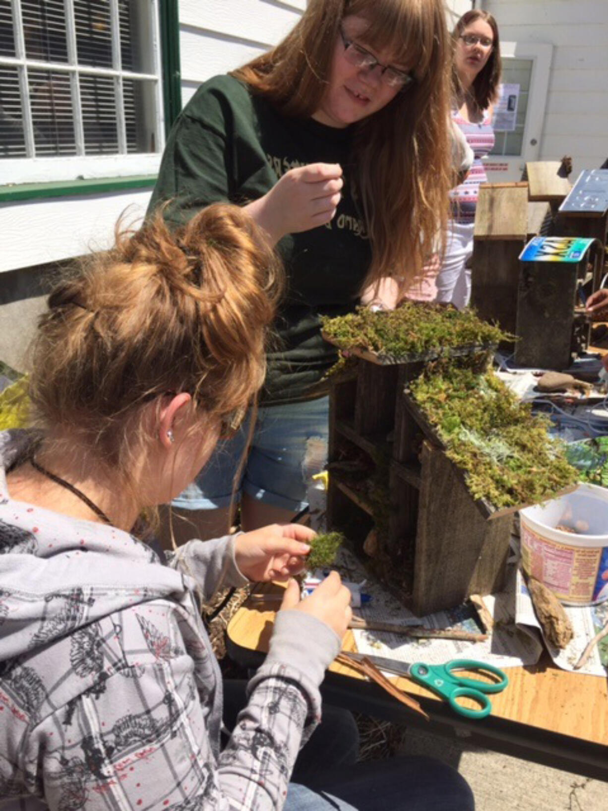 Image: Clark County Skills Center students constructing bee houses to sell to benefit Columbia Springs and help save the bees.