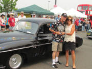 East Vancouver: Rick Davidson, left, and Rep. Lynda Wilson, R-Vancouver, at the Veterans Court Board's cruise-in on Aug. 22, where Davidson won Best Muscle.