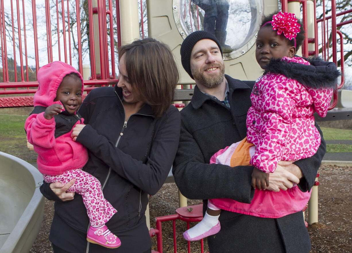 Jake and Natalie Koprowski of Washougal adopted Lucie, left, and Myradie from the Democratic Republic of Congo. The Koprowskis have been unable to find the girls a primary care provider since bringing them home Jan.