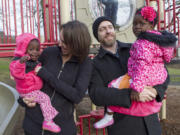 Jake and Natalie Koprowski of Washougal adopted Lucie, left, and Myradie from the Democratic Republic of Congo. The Koprowskis have been unable to find the girls a primary care provider since bringing them home Jan.