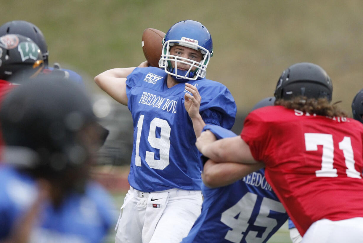 East team quarterback Lexington Reese throws against the West squad during Saturday's Freedom Bowl Classic at McKenzie Stadium.