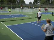 Dozens of people showed up to play pickleball at Hathaway Park on Monday morning.