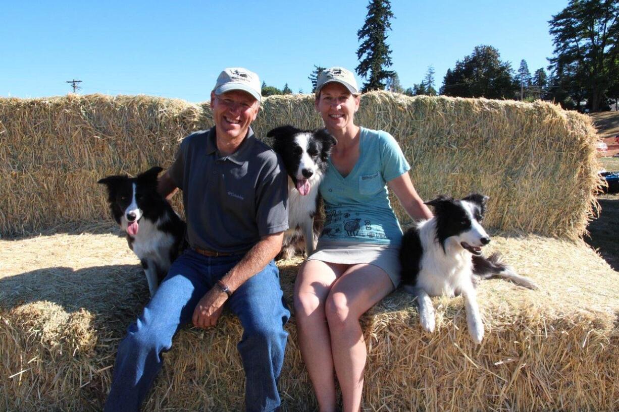 Lynn and Alison Johnston with dogs Carly, from left, Jesse and Anna.