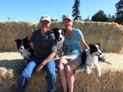 Lynn and Alison Johnston with dogs Carly, from left, Jesse and Anna.