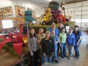 The Columbian
Just a few of the many volunteers who built or contributed to Battle Ground's float this year: from left, Adeena Wade, Rich Rubin, Trish Rubin, Tammy Burton, Mike Burton, Austin Alling, Barbara Garrison, Pat Stanfield and Shirley Stowell.