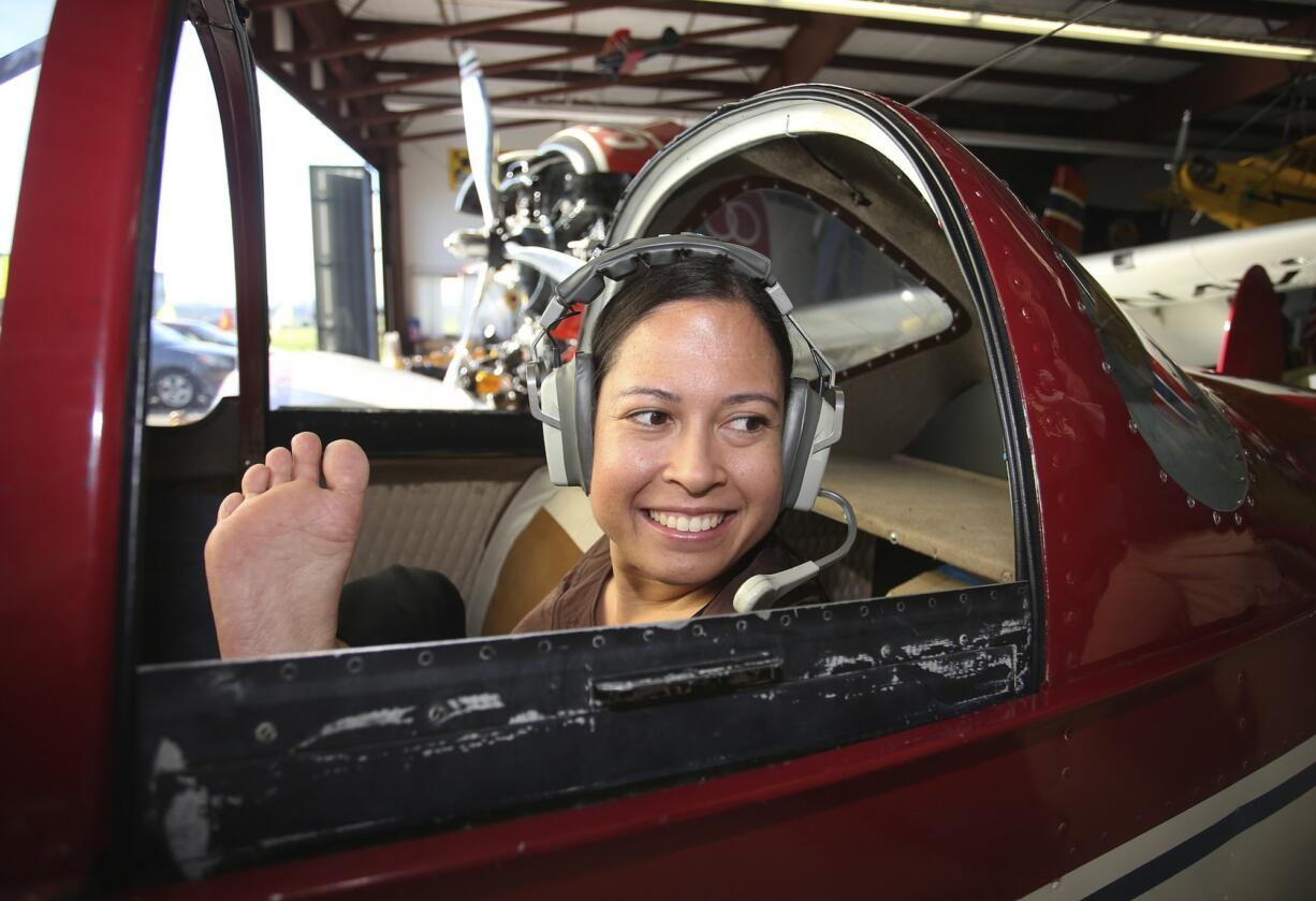 Jessica Cox, recognized by Guinness World Records as the first armless pilot in aviation history, spoke Saturday at the Pearson Field Education Center.