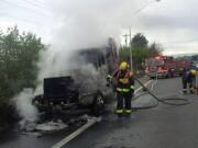 A truck-tractor caught fire on state Highway 14 Thursday.