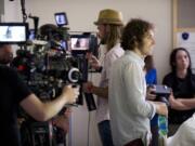 A &quot;Portlandia&quot; crew, including director Jonathan Krisel, right, filmed Tuesday in an otherwise empty wing of PeaceHealth Southwest Medical Center in Vancouver.