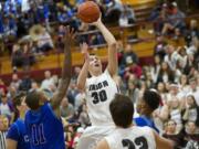 Cameron Cranston shoots as Union comes back in the fourth quarter to beat Curtis at the Hardwood Classic Regional Round, Friday, February 27, 2015.(