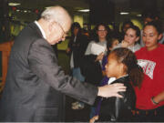 Kiahna Elliott meeting Eugene Lang, founder of the national I Have a Dream program,  when she was in the second grade. Kiahna Elliott meeting Eugene Lang, founder of the national I Have a Dream program,  when she was in the second grade.   Kiahna Elliott at her University of Washington graduation this spring.