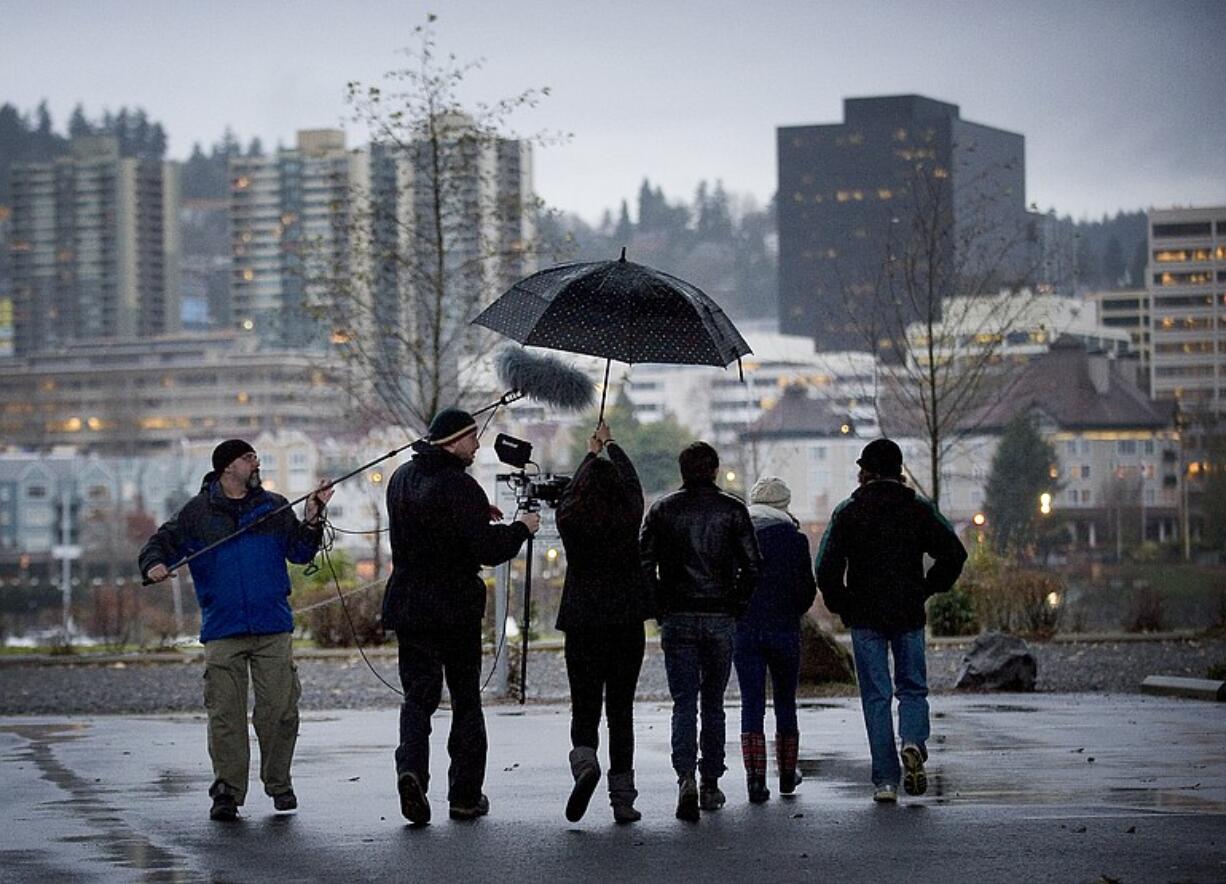 The cast and crew of &quot;Black Eyed Kids&quot; film near the east side of the Hawthorne bridge in Portland.