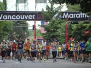 Runners get underway in the 2015 Vancouver USA Marathon on Sunday at Esther Short Park.