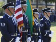 The 142nd Fighter Wing of the Oregon Air National Guard presents the colors Sunday during a celebration of the U.S.