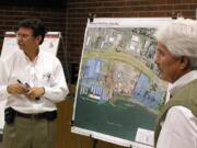 Consultants Dave Christensen, left, and Jim Darling listen to citizens as they review plans to redevelop waterfront property in Washougal