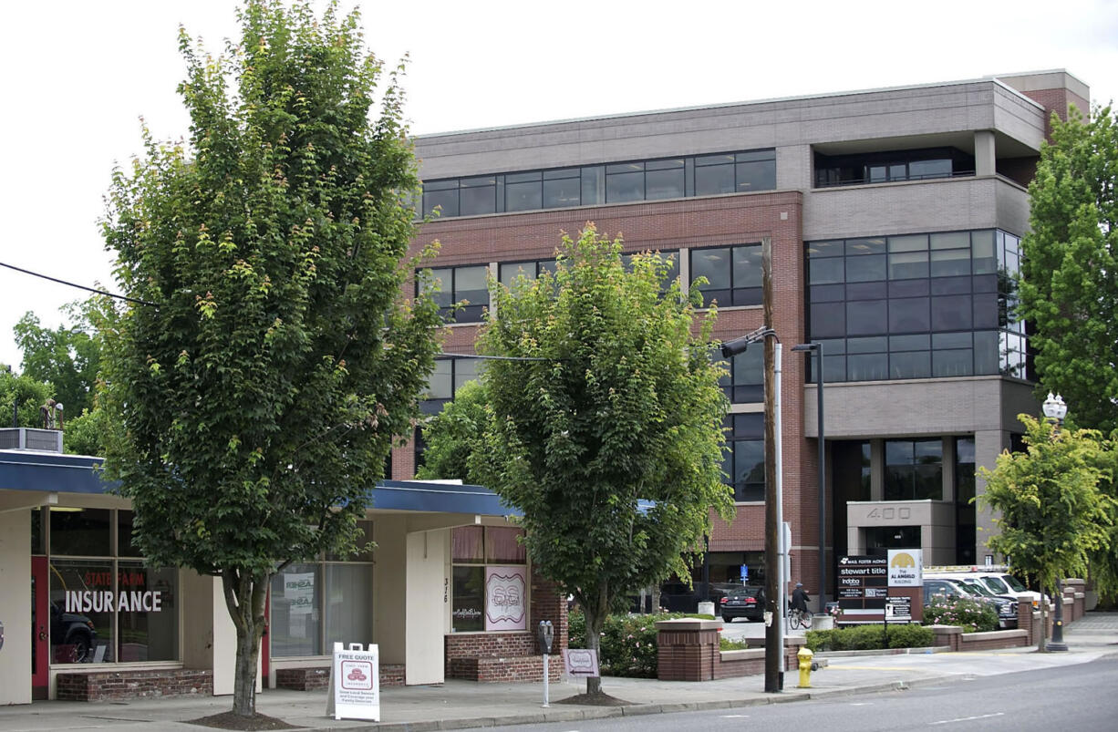 The small storefront building on East Mill Plain, in front of the Al Angelo Building at 400 E.