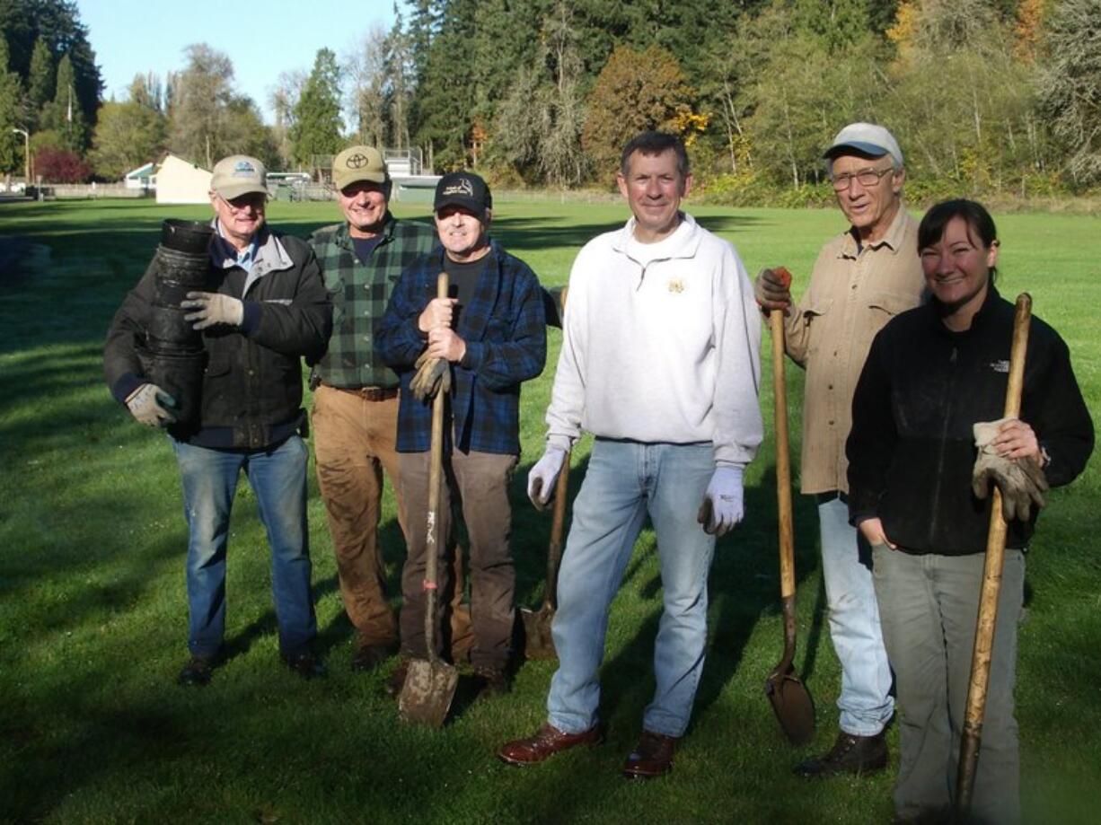 Gee Creek: Volunteers James Barhitte, from left, Ridgefield Mayor Ron Onslow, Lynn Cornelius, Councilman Don Stose, Jim Walker and Jill Peoples helped plant trees.