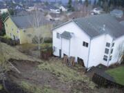 A small landslide in Camas damaged a home on Sunday.