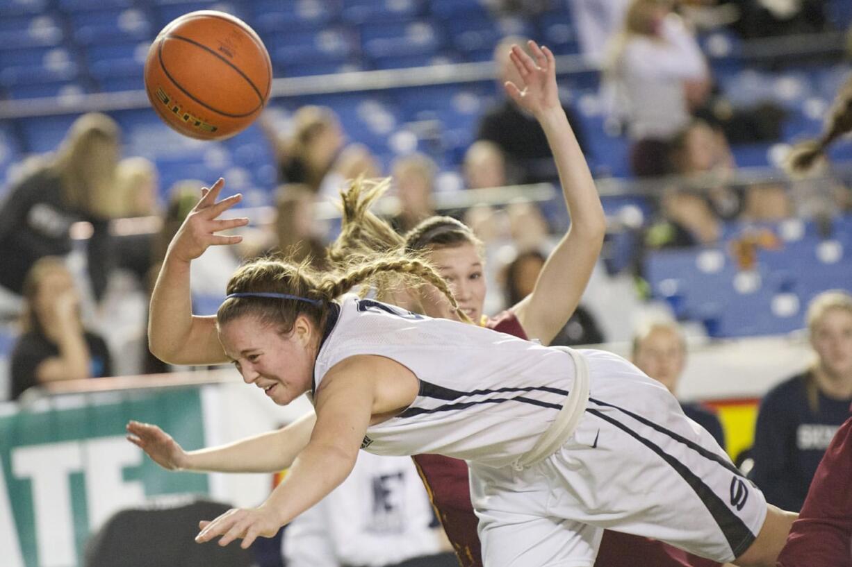 Hannahjoy Adams fights for a loose ball as Skyview looses to Moses Lake 47-36 at the 2015 WIAA Hardwood Classic Girls 4A tournament at the Tacoma Dome, Thursday, March 5, 2015.