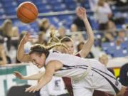 Hannahjoy Adams fights for a loose ball as Skyview looses to Moses Lake 47-36 at the 2015 WIAA Hardwood Classic Girls 4A tournament at the Tacoma Dome, Thursday, March 5, 2015.