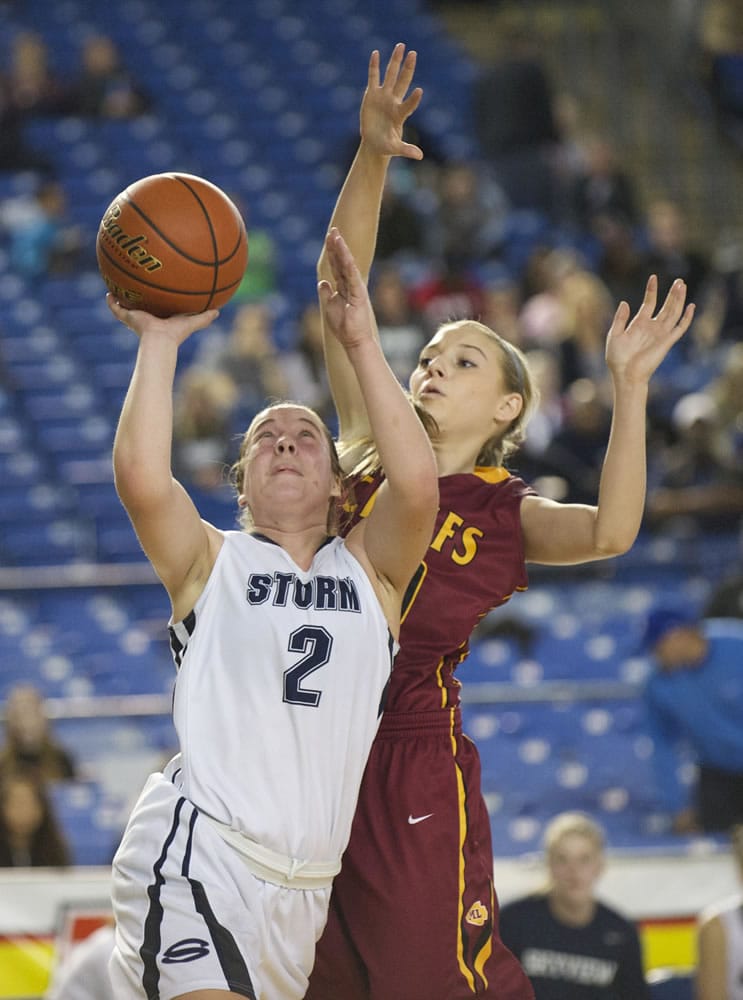 Hannahjoy Adams drives to the basket as Skyview loses to Moses Lake 47-36 at the 2015 WIAA Hardwood Classic Girls 4A tournament at the Tacoma Dome, Thursday, March 5, 2015.