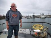 Crab fisherman Larry Thevik discusses his concerns regarding three proposed oil terminal sites in Grays Harbor County on his boat, the Midnight Star, while docked in Westport on Thursday, June 19, 2014.