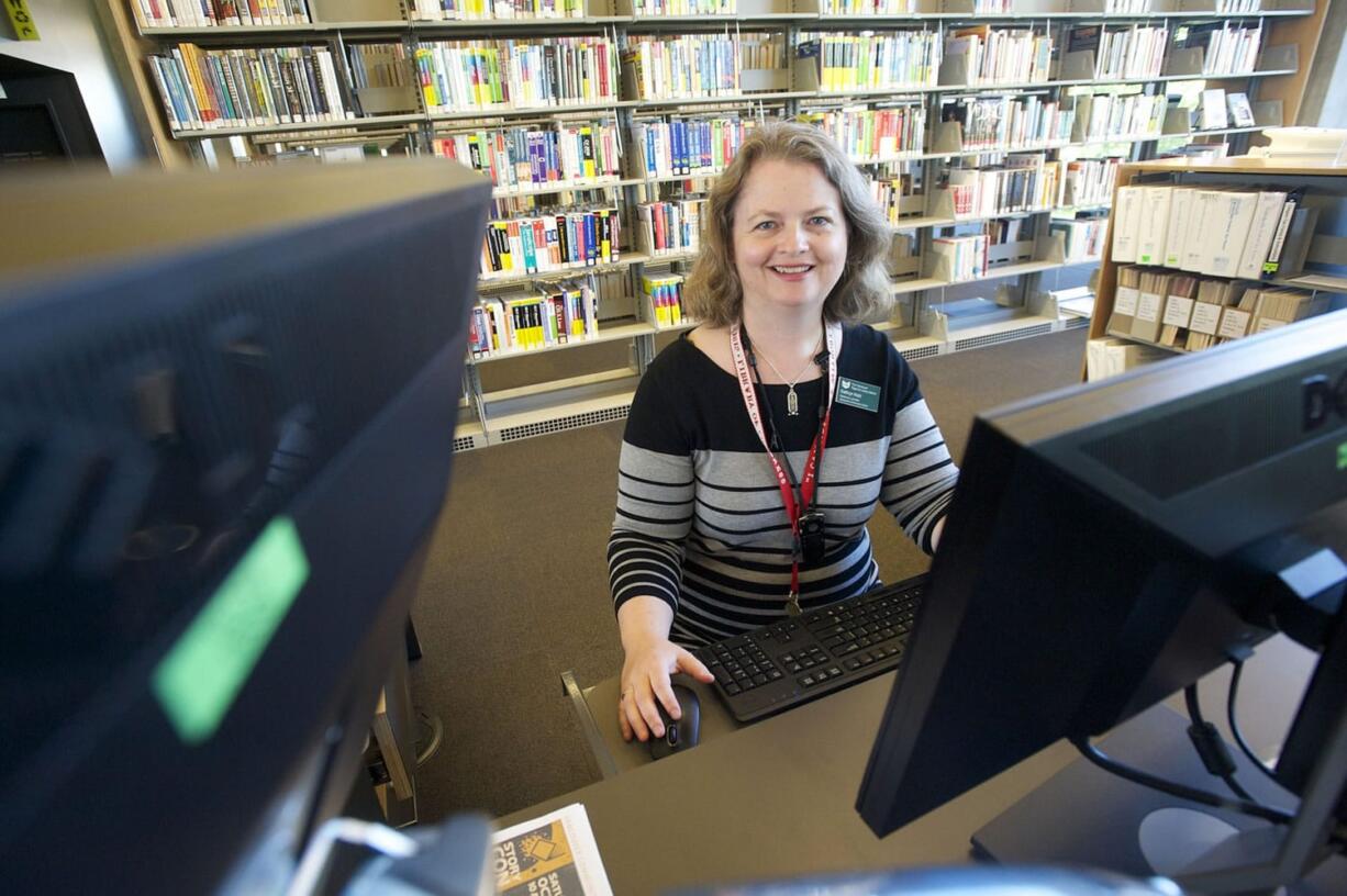 Kathryn Kohl works Thursday at the Vancouver Community Library in downtown Vancouver.