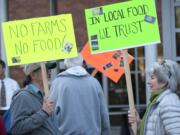 Local farmers and food advocates rally in front of the Clark County Public Service Building prior to Tuesday's council meeting.