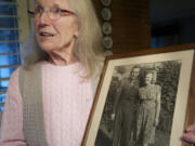 Gerda McMillan holds a 66-year-old old photograph of herself and her late husband taken during the American occupation of Germany following World War II.