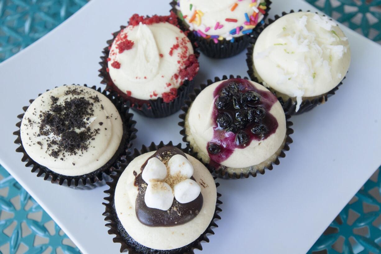 A selection of cupcakes are seen at Cake Happy in Camas.