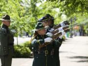 Photos by Steven Lane/The Columbian
A multi-agency honor guard fires the 21-gun salute Thursday morning at the 2015 Annual Law Enforcement Memorial Ceremony.