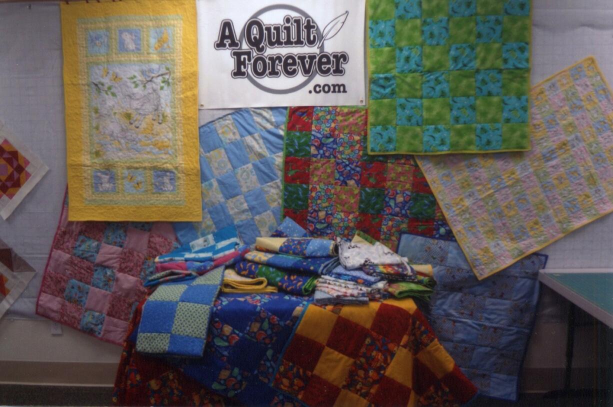 Battle Ground: Some of the 30-plus quilts donated to Babies in Need by a group of four Battle Ground women.