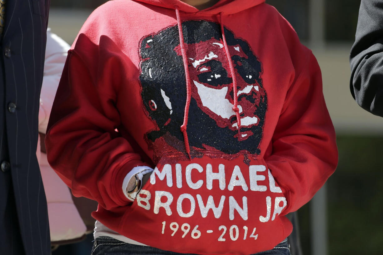 Lesley McSpadden, the mother of Michael Brown, wears a sweatshirt remembering her son during a news conference in Clayton, Mo.