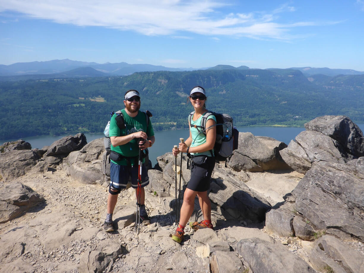 Whitney La Ruffa, left, and Liz Thomas take a break atop Angels Rest on the Oregon side of the Columbia River Gorge.