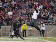 Washington State receiver Vince Mayle, right, has set single-season school records for catches (101) and receiving yards (1,405).