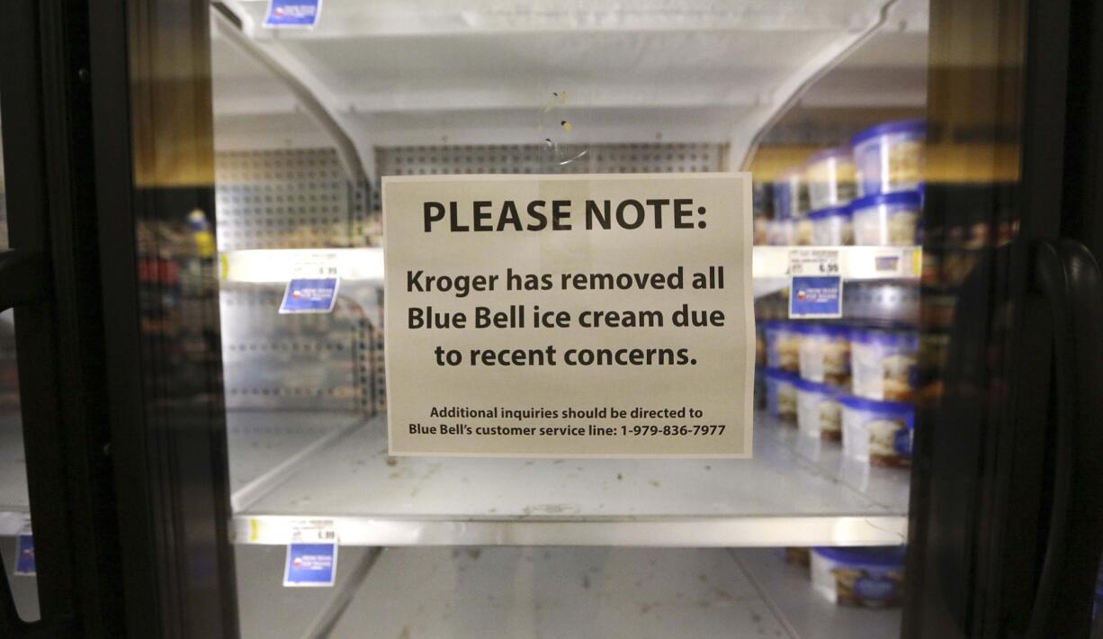 A sign explains why shelves sit empty of Blue Bell ice cream April 21 at a grocery store in Dallas.