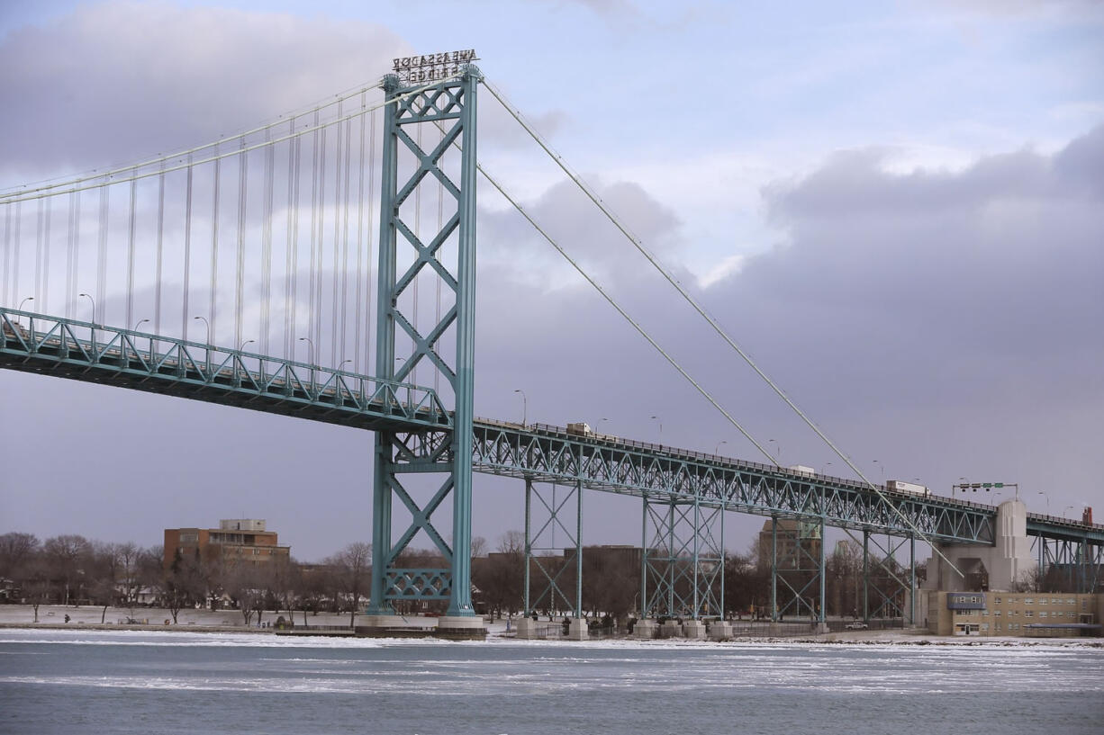 In a photo from Jan. 6, 2015 in Detroit, the Ambassador Bridge leading into Windsor, Ontario is seen from Detroit. The U.S. Department of Homeland Security says the Obama administration and Canada have agreed with Canada for financing a key piece of a planned $2.1 billion bridge connecting Detroit and Windsor, Ontario. The department said Wednesday, Feb. 18, 2015, the agreement involves funding for a toll plaza on the U.S. side of the international crossing. Michigan Sen. Debbie Stabenow released a statement saying the agreement &quot;is a critical step forward&quot; for the project, long stymied by opposition from owners of the nearby Ambassador Bridge who seek to add a span of their own across the Detroit River.