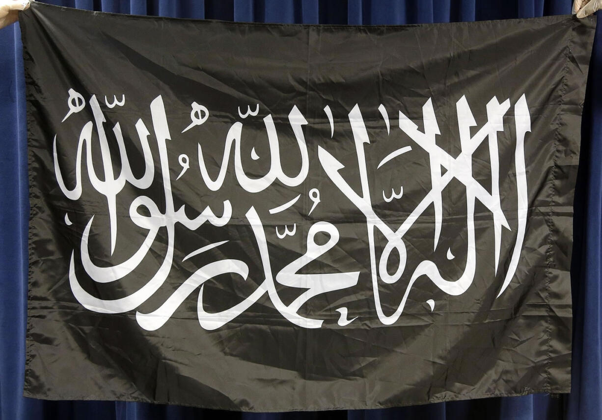 A flag presented as evidence during the federal death penalty trial of Dzhokhar Tsarnaev, is displayed at Wednesday in the federal courthouse where Tsarnaev is being tried in Boston.