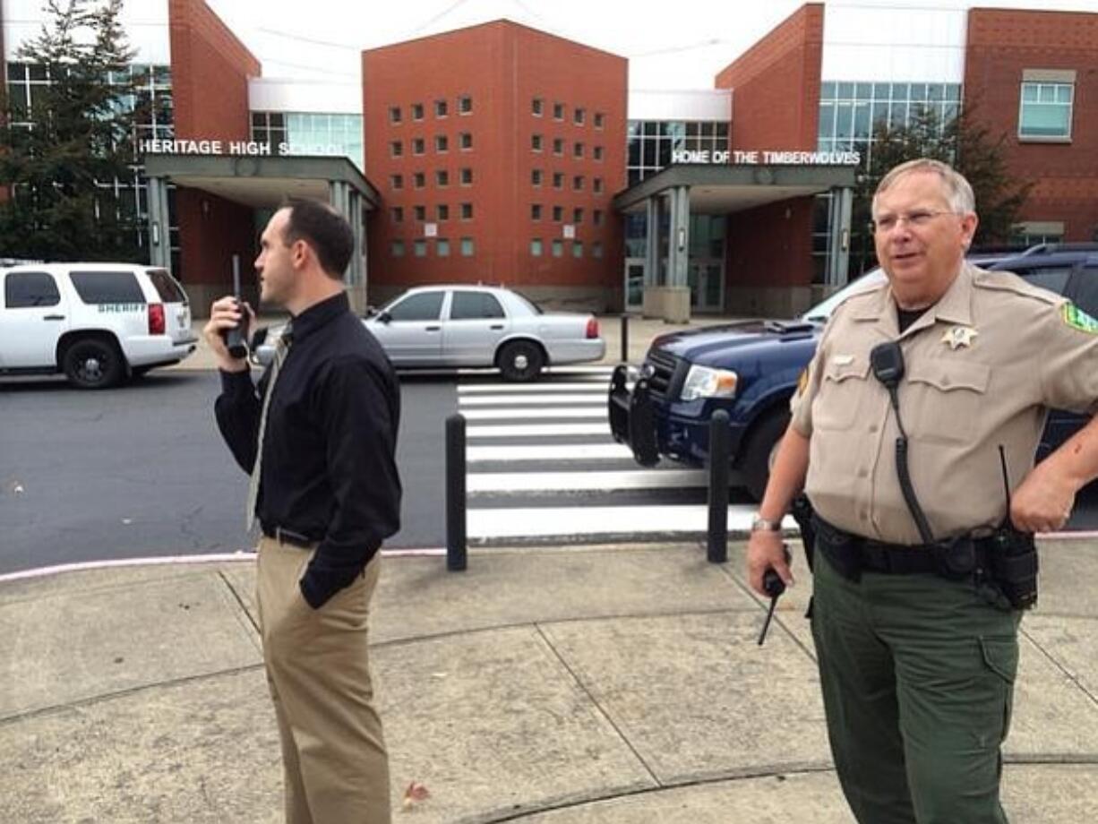 Clark County sheriff's deputies investigate a bomb threat at Heritage High School Tuesday afternoon.