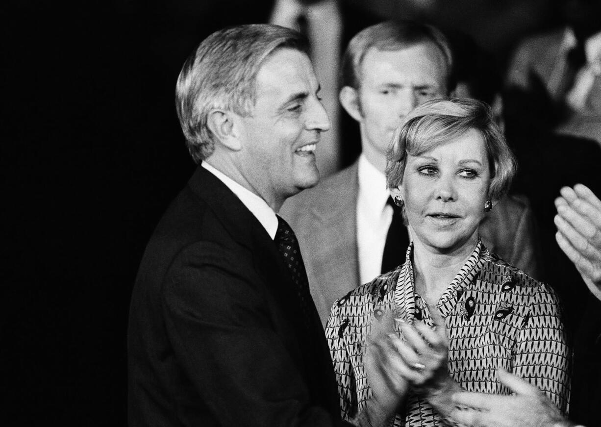 Chicago Mayor Jane Byrne, right, applauds Vice President Walter Mondale before his speech in September 1980 at Medina Temple, in Chicago. Byrne, Chicago's first and only female mayor, has died at the age of 80.