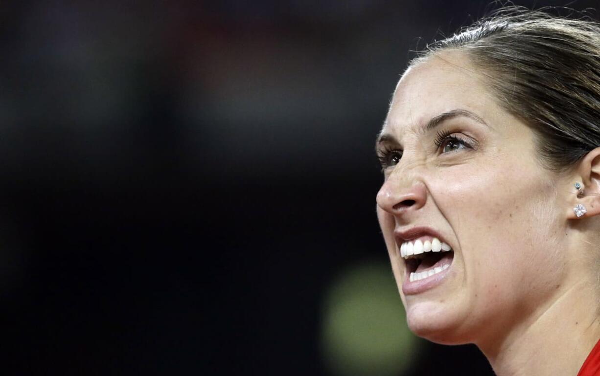 United States' Kara Winger grimaces as she competes in the women's javelin final at the World Athletics Championships at the Bird's Nest stadium in Beijing, Sunday, Aug. 30, 2015.