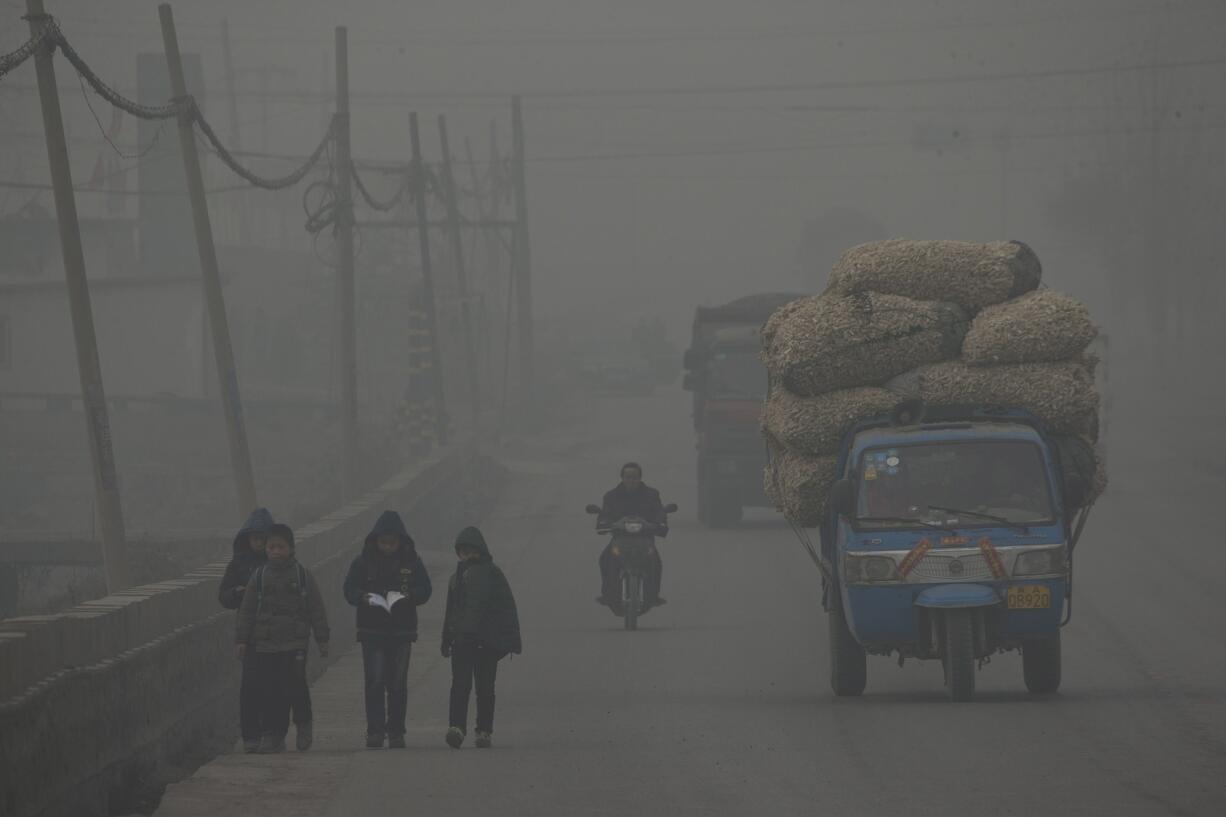 Children walk back home after school Feb.