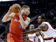 Portland forward LaMarcus Aldridge, right, checks Los Angeles Clippers forward Blake Griffin, left, during Wednesday's game at the Moda Center.