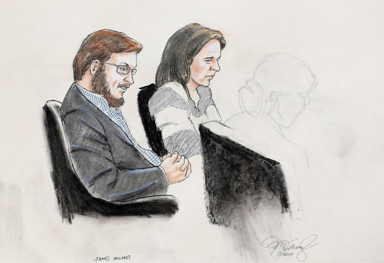 In this courtroom sketch, James Holmes, left, and defense attorney Tamara Brady are depicted, as they sit in court on the first day of jury selection in Holmes' trial, at the Arapahoe County Justice Center on Tuesday in Centennial, Colo.