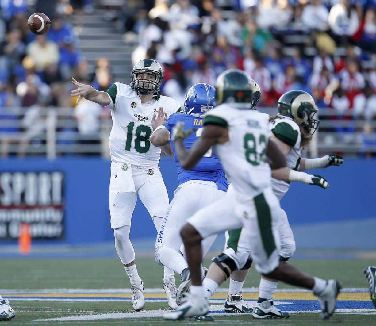 Colorado State quarterback Garrett Grayson passes to top receiver Rashard Higgins (82) against San Jose State.