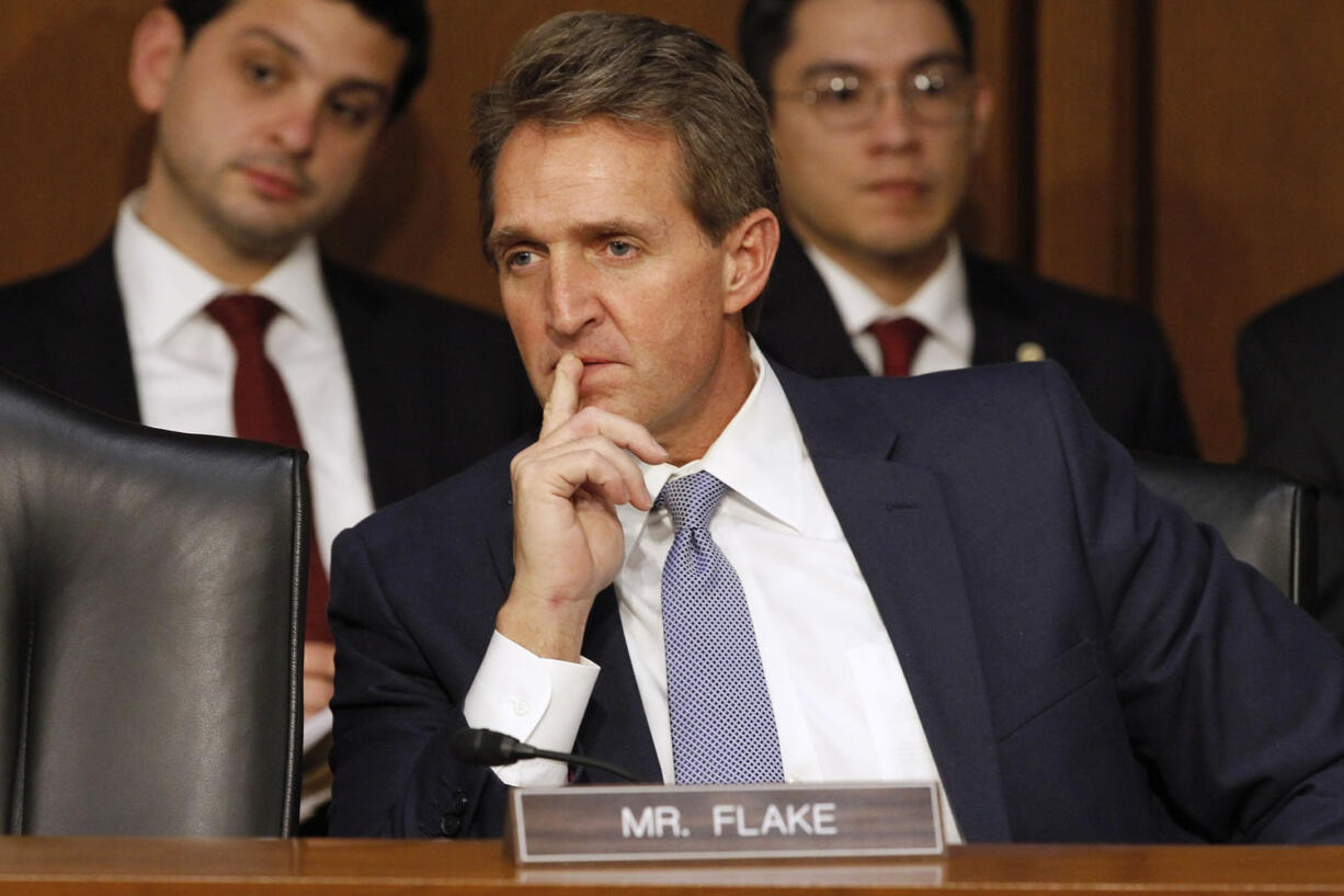 Sen. Jeff Flake, R-Ariz., listens during a Senate Judiciary Committee hearing on Capitol Hill in Washington. on Jan. 28.