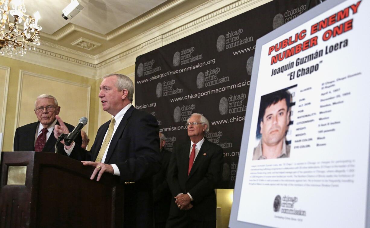 From left, Al Bilek, executive vice president of the Chicago Crime Commission, Jack Riley, Special Agent In Charge for the DEA, Chicago Field office, and Peter Bensinger former administrator of the U.S. Drug Enforcement Administration announce that Joaquin &quot;El Chapo&quot; Guzman, a drug kingpin in Mexico, is Chicago's  Public Enemy No.