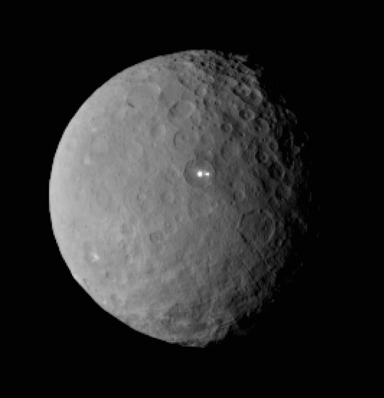 NASA
This Feb. 19 image shows the dwarf planet Ceres, which is about 590 miles in diameter. NASA's Dawn is preparing to rendezvous with Ceres on Friday.