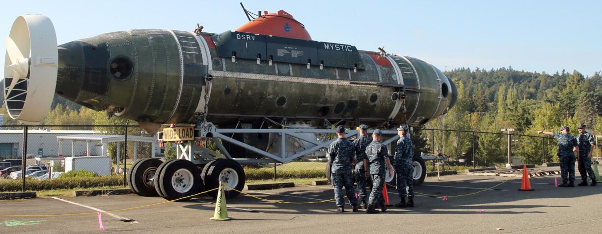 Sailors from Naval Base Kitsap Bangor take a look at the DSRV Mystic on display at the Naval Undersea Museum in Keyport on Thursday.