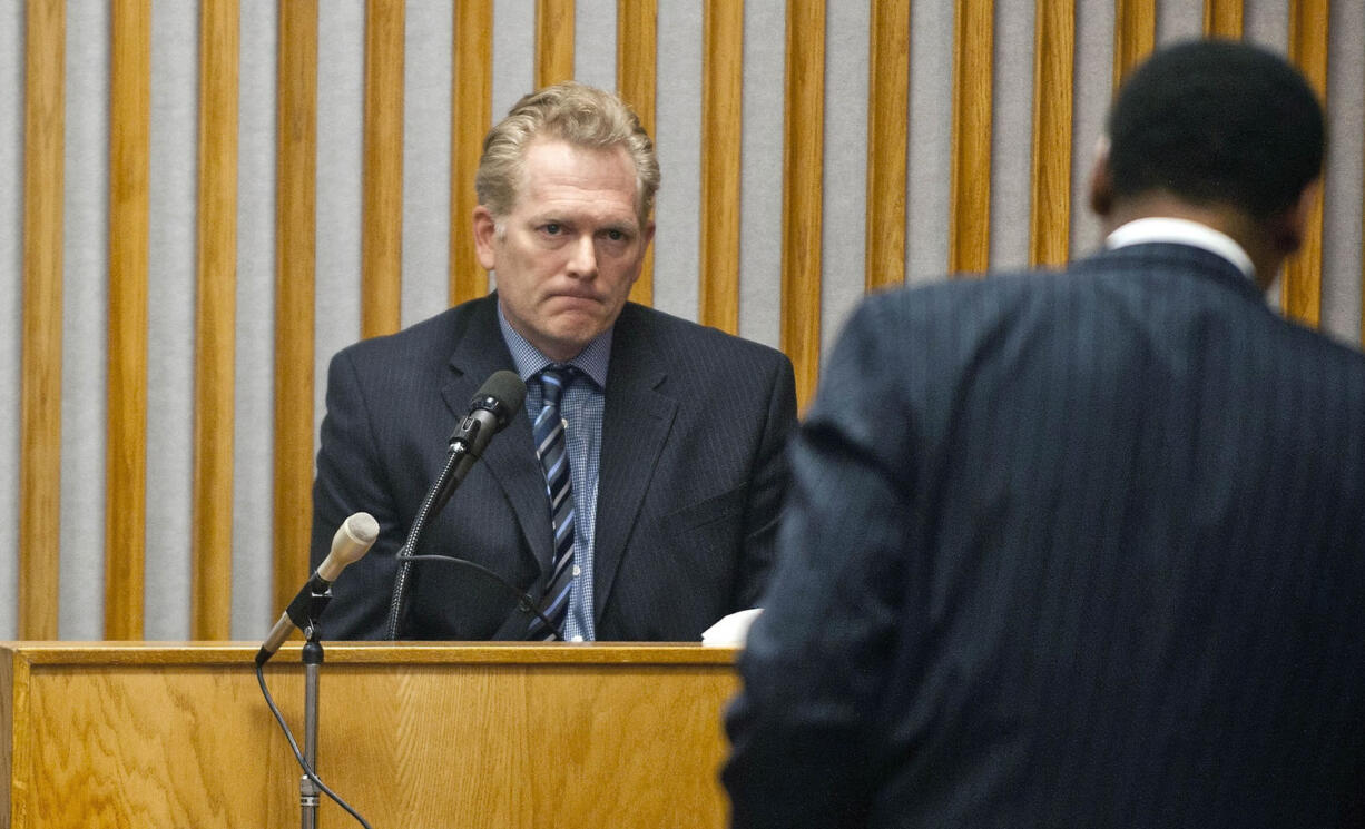 Film director Randall Miller, left, takes the witness stand during a hearing before Chatham County Superior Court, Judge John Morse in Savannah, Ga.