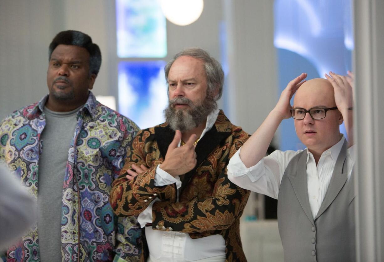 Craig Robinson, from left, Rob Corddry and Clark Duke appear in a scene from &quot;Hot Tub Time Machine 2.&quot;